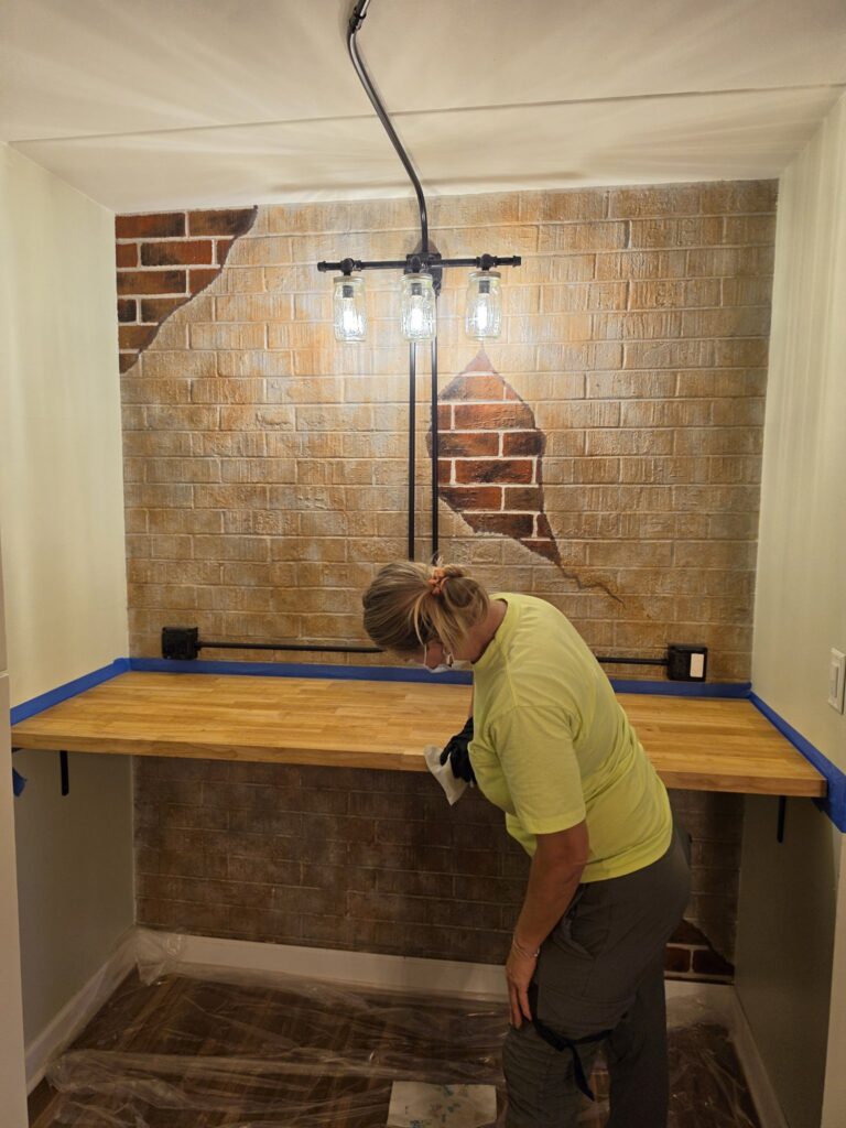 Finished butcher block countertop wiped down by a carpenter in Chicago