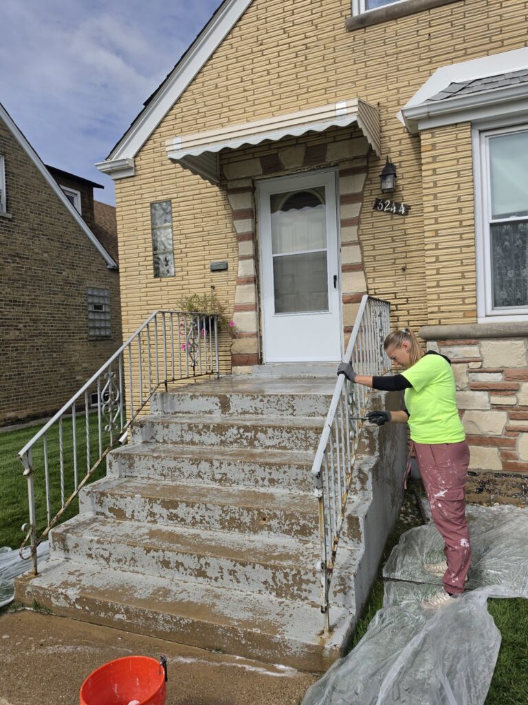 Concrete steps painting Chicago — scraping and prepping peeling front steps before painting