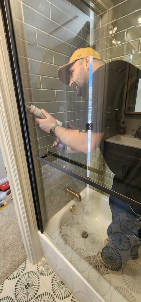 Sealing shower glass