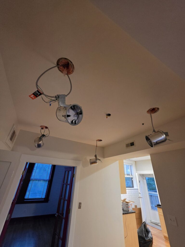Recessed light installation Chicago — finished kitchen with lit recessed lights