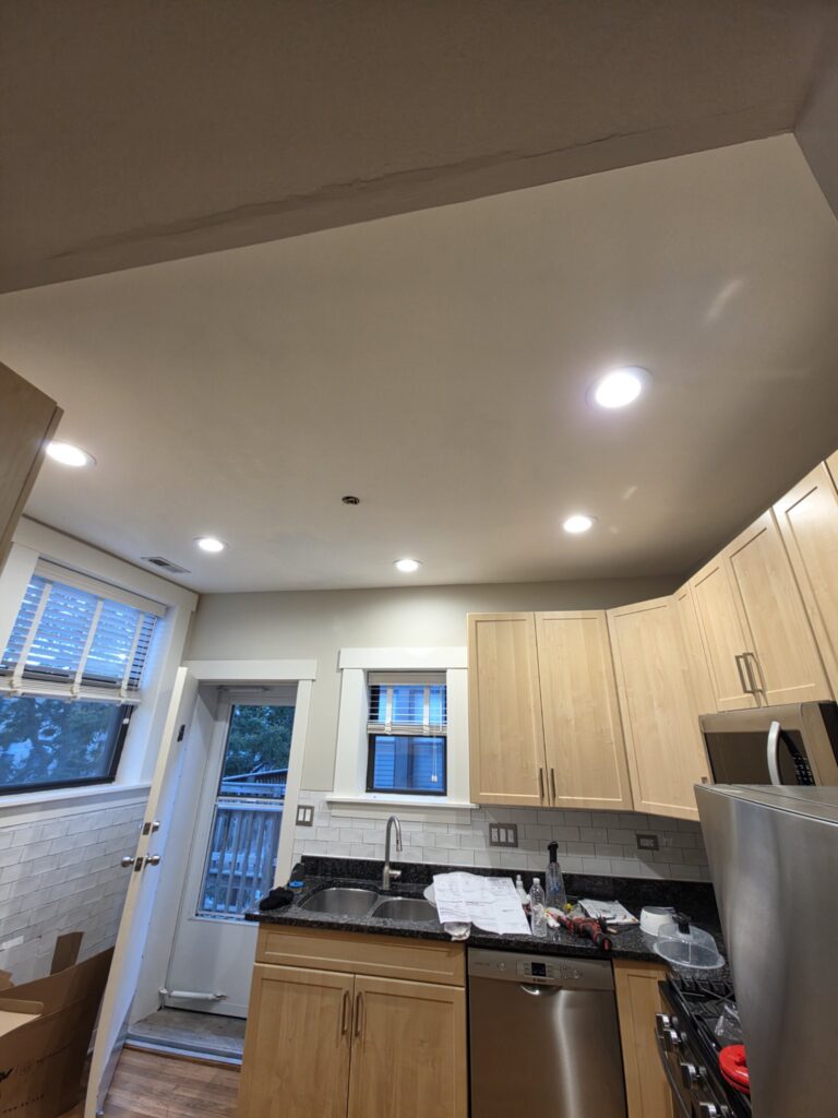 Recessed light installation Chicago — kitchen ceiling with recessed lights in progress